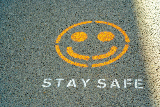 ash felt with words stay safe and smiley sign